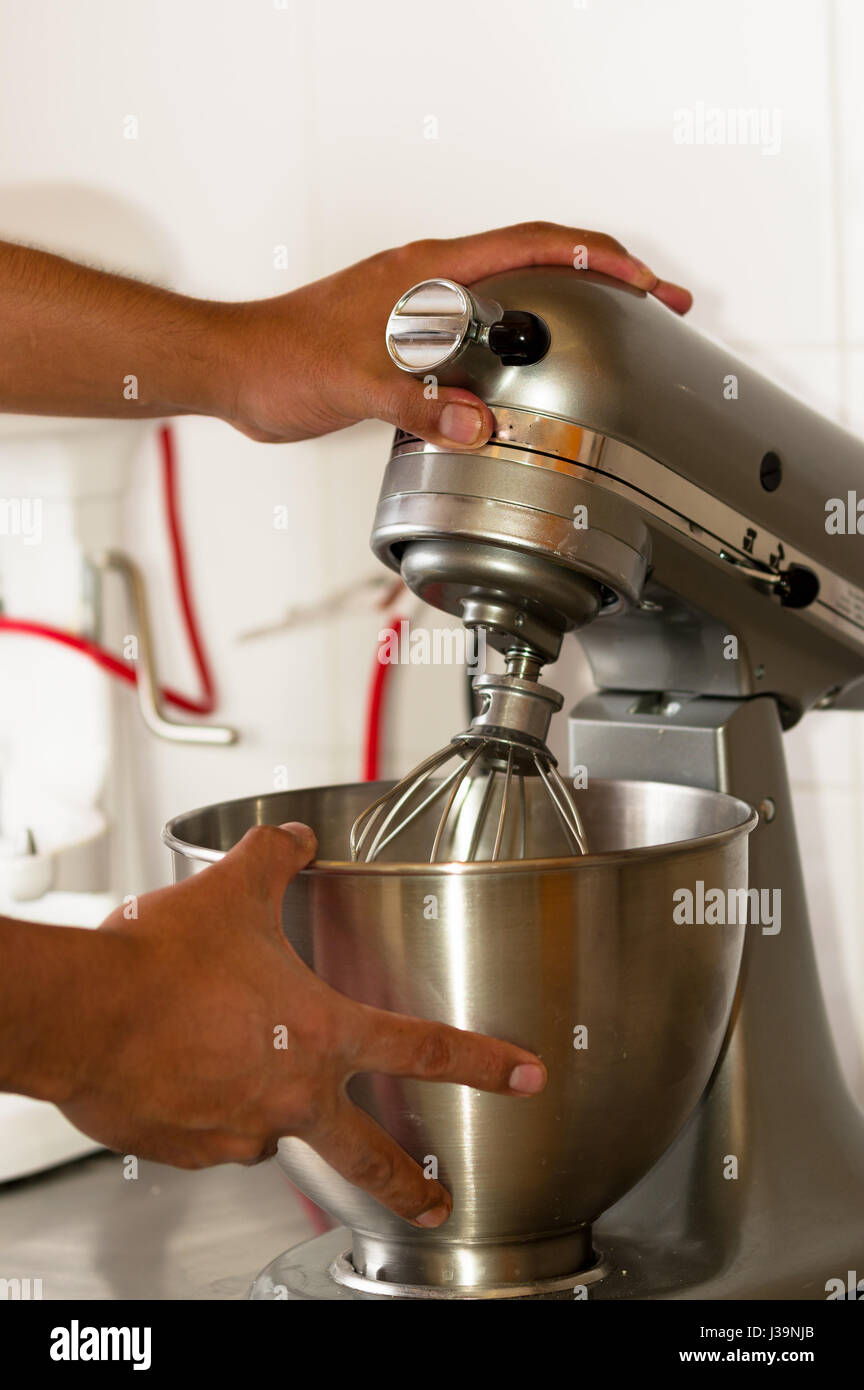 Bread Mixer In Bakery, mixing dough for baguettes in a bakery machine