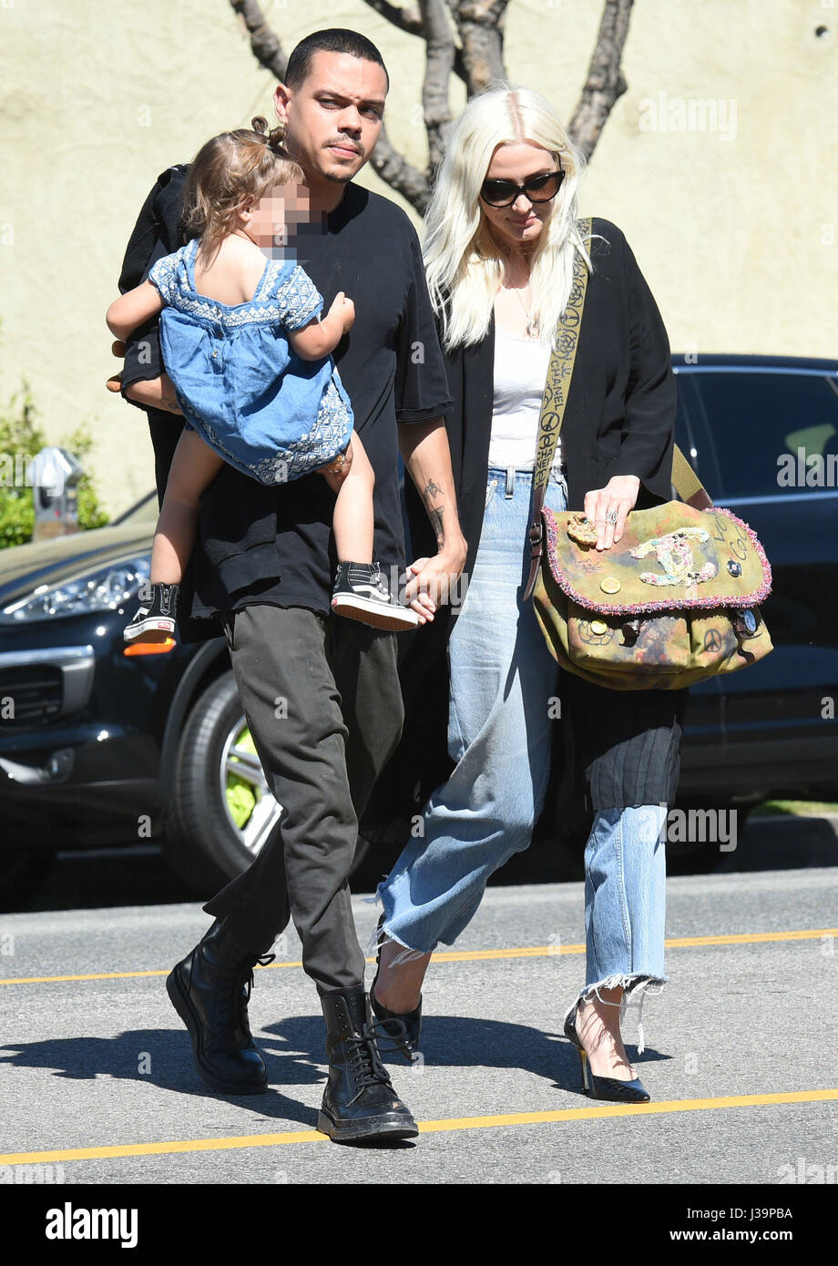 Ashlee Simpson and Evan Ross cross Ventura Boulevard with their