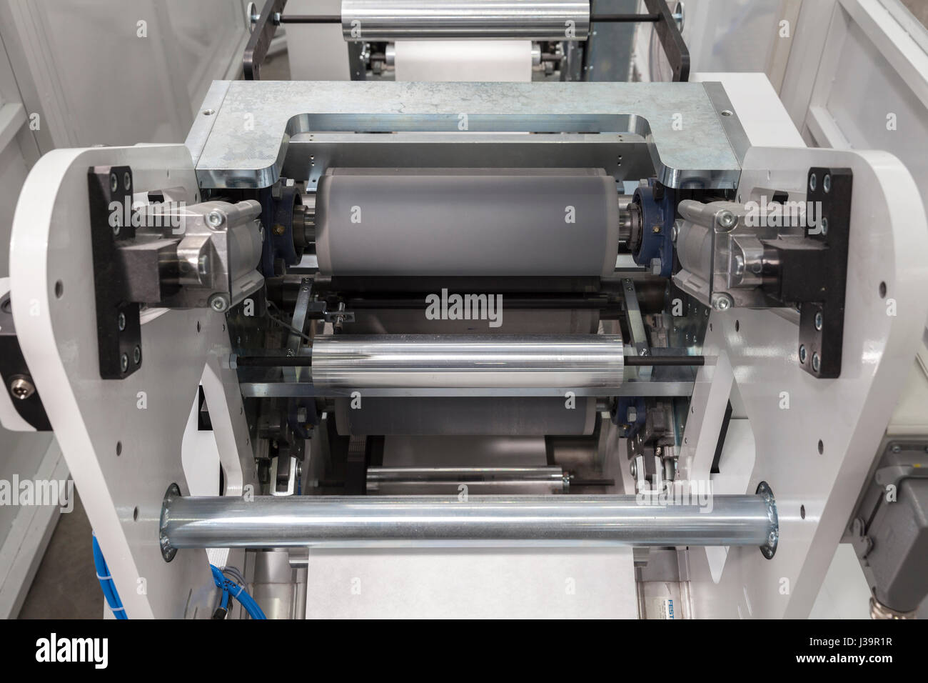 paper rolling machine, white paper on roll Stock Photo Alamy