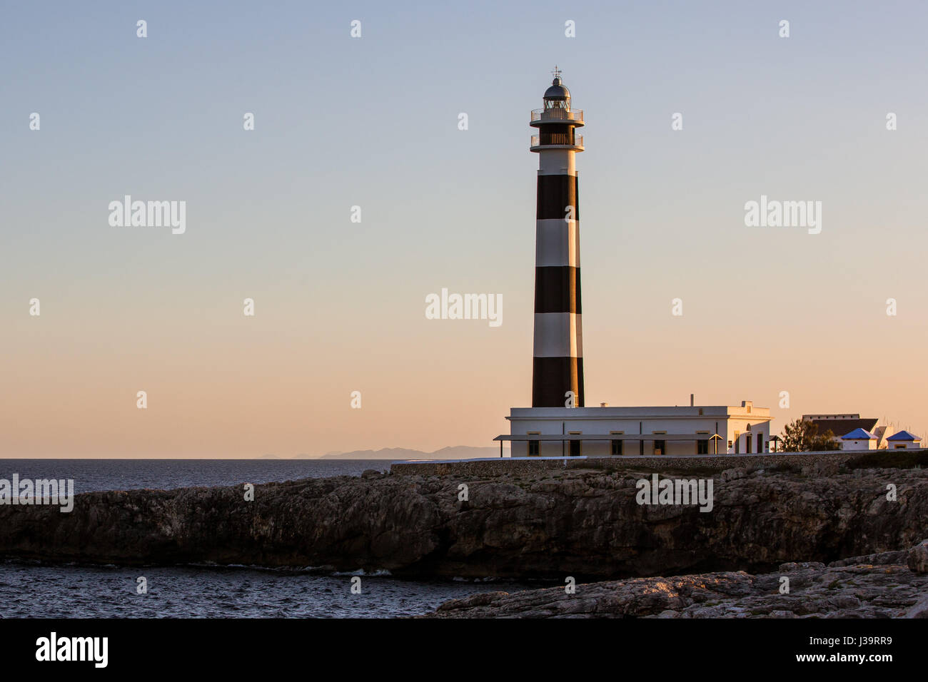 Cap d'Artrutx Lighthouse, Cala'n Bosch, Menorca, Balearics, Spain Stock Photo