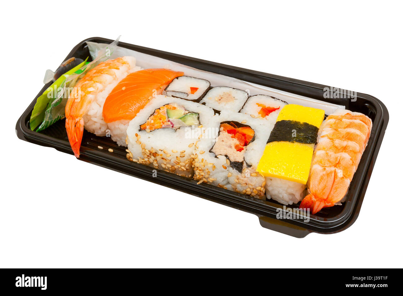 Set of assorted sushi served in a plastic box Stock Photo