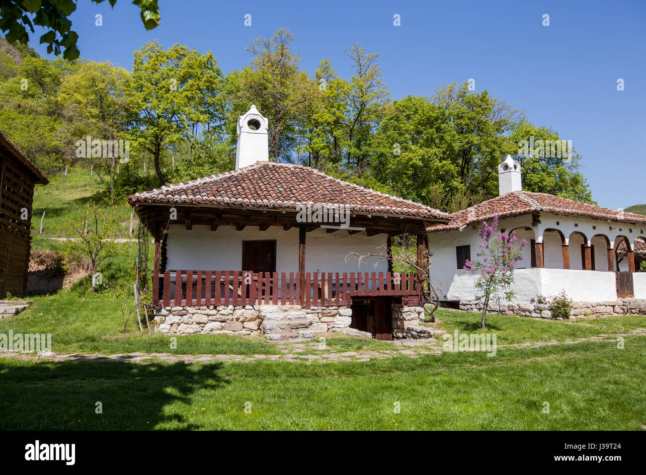 Traditional house in village at eastern Serbia, a combination of wood and stone, near Donji Milanovac. Stock Photo