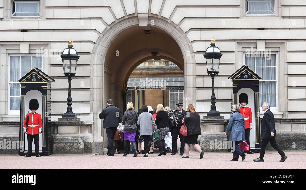 Staff arriving at Buckingham Palace in London, after it was announced that the Duke of Edinburgh