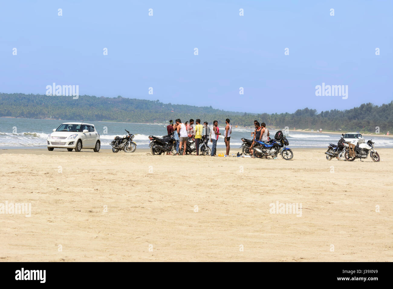 Motorbike riders on Muzhappilangad beach, Kerala’s only drive-in beach, Kannur Cannanore), Kerala, South India, South Asia. Stock Photo