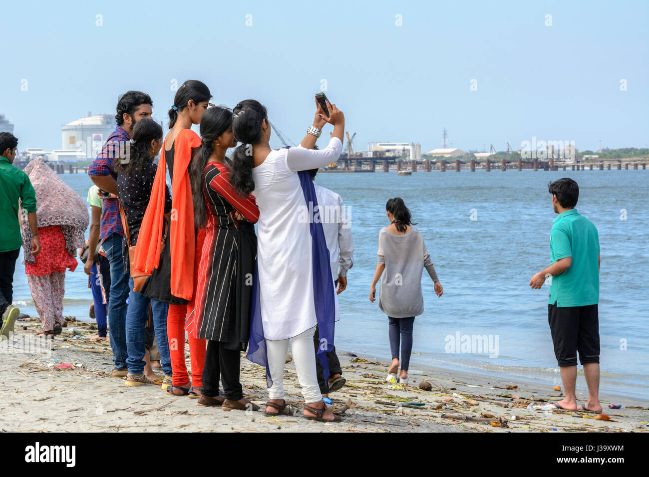 Young People Taking Selfies On The Beach In Fort Kochi - 