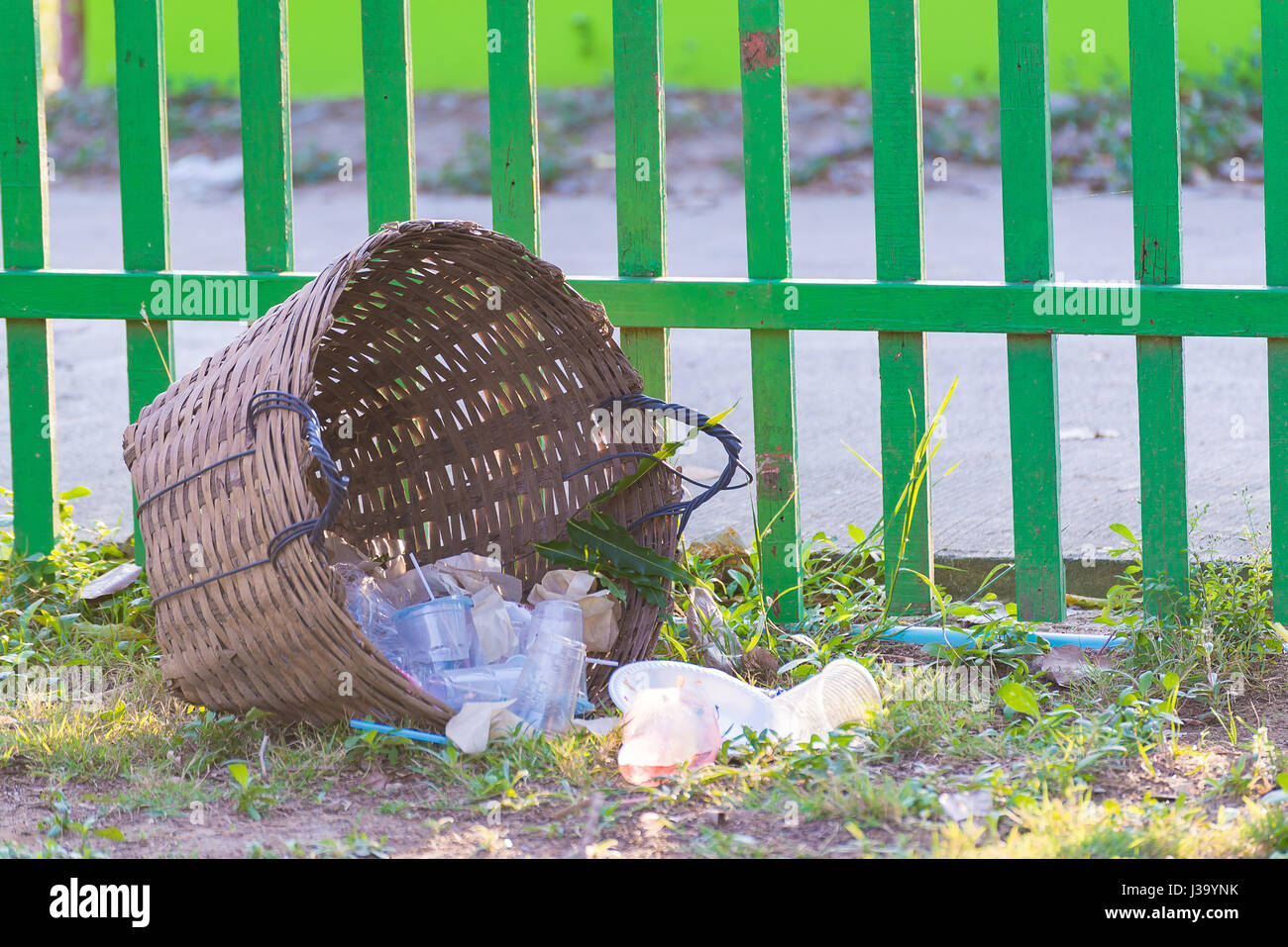Weave trash basket, Dustbin made from bamboo weaving on grass field
