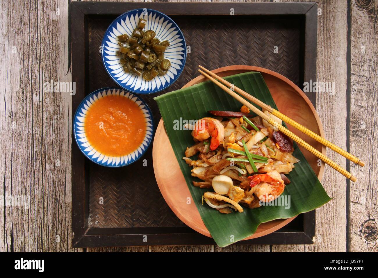 Char Kway Teow. Stirfried flat rice noodles with shrimps, sausage