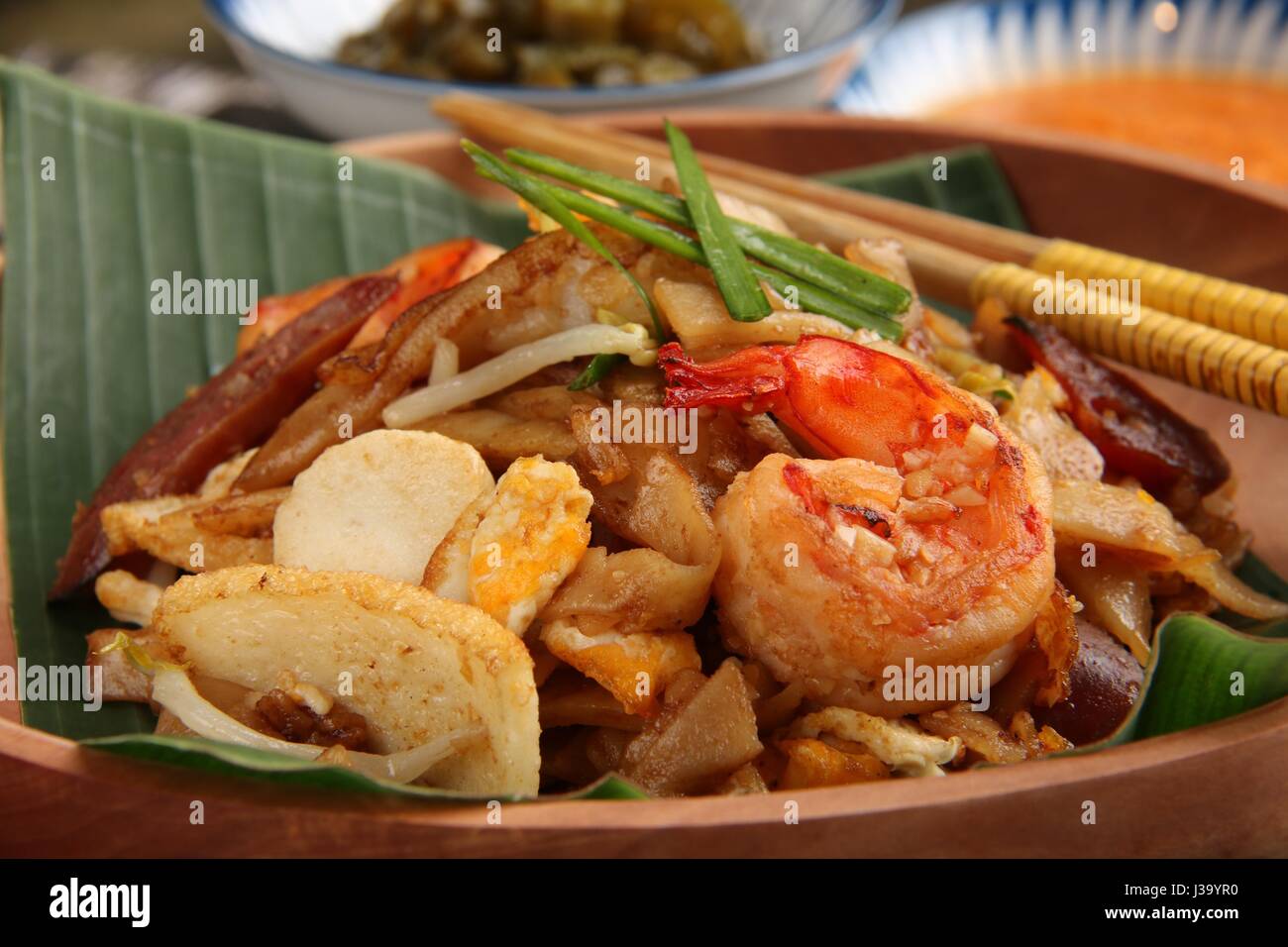 Char Kway Teow. Stirfried flat rice noodles with shrimps, sausage