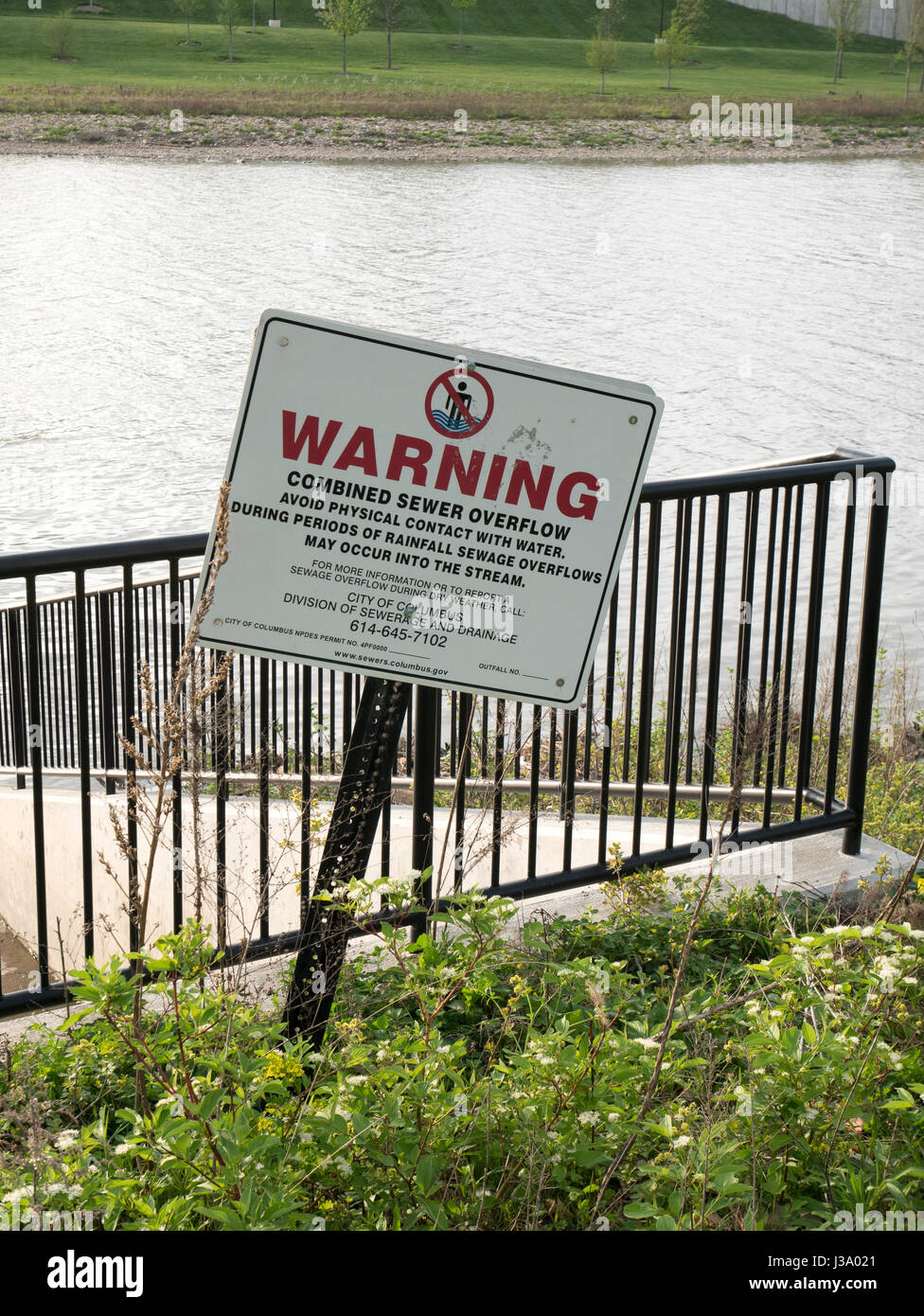 Water pollution warning on storm sewer overflow. Scioto River, Columbus
