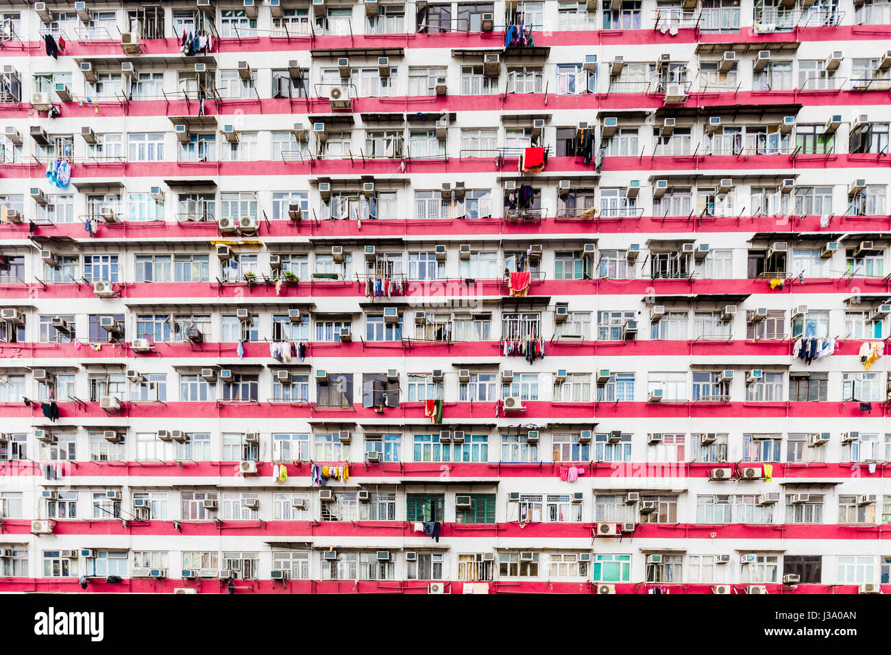 Traditional style apartments in Hong Kong, residents live in cramped conditions. Mong Kok is situated on Kowloon side. Stock Photo