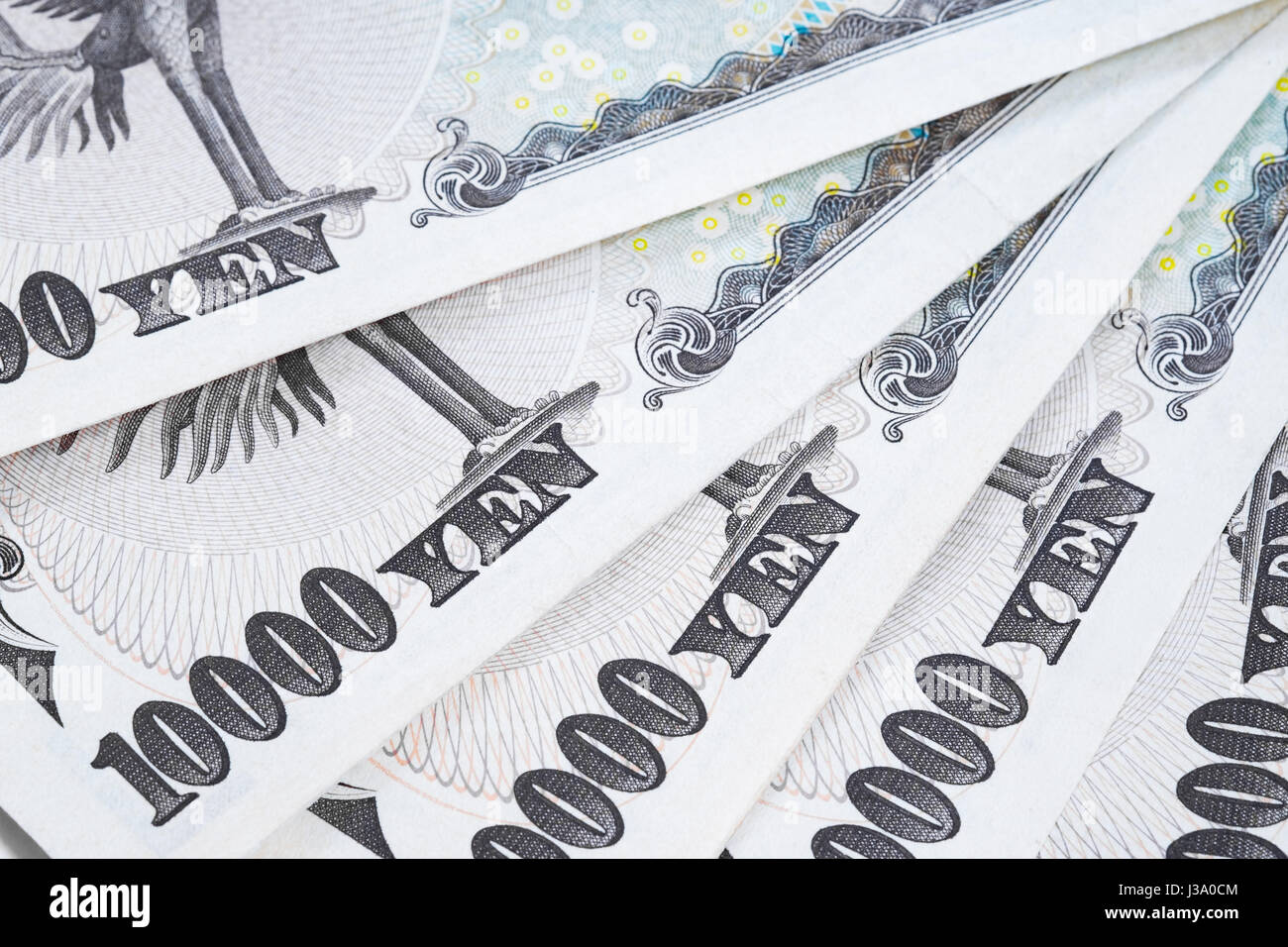 Japanese 10000 yen notes. Imperial Japanese Paper Currency background. Stock Photo
