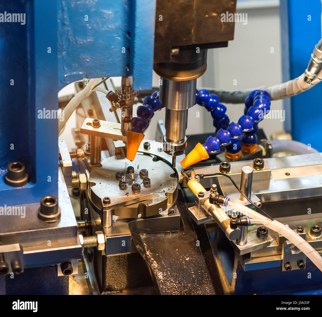 CNC turning machine drilling process in metal industry Stock Photo