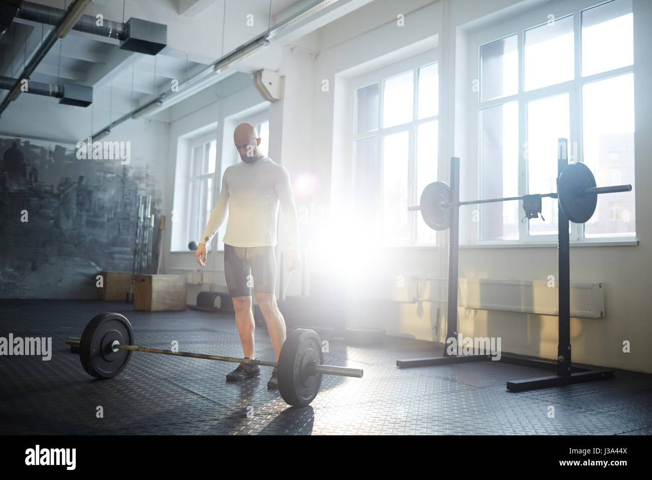 Man in Weightlifting Workout Stock Photo