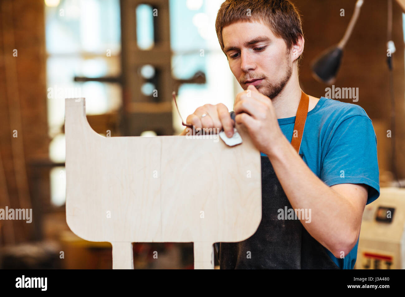 Young Man Making Wooden Furniture Stock Photo Alamy