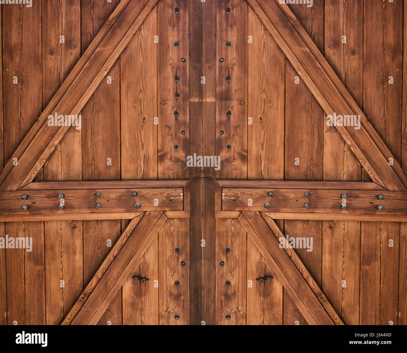 Wooden door with two crosses Stock Photo