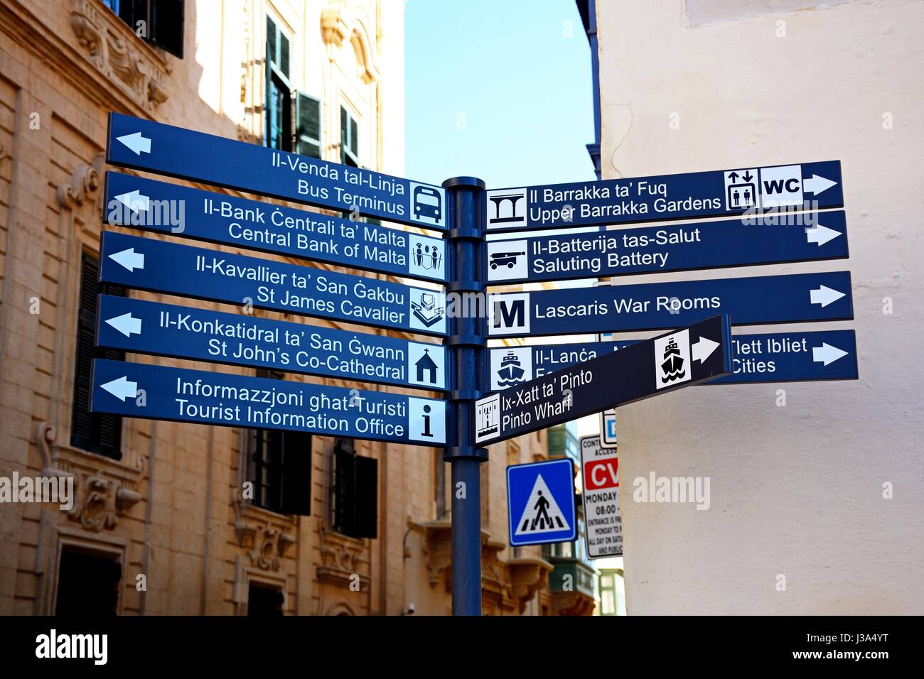 Signpost on corner of Castille Street and Triq San Pawl, Valletta, Malta, Europe. Stock Photo