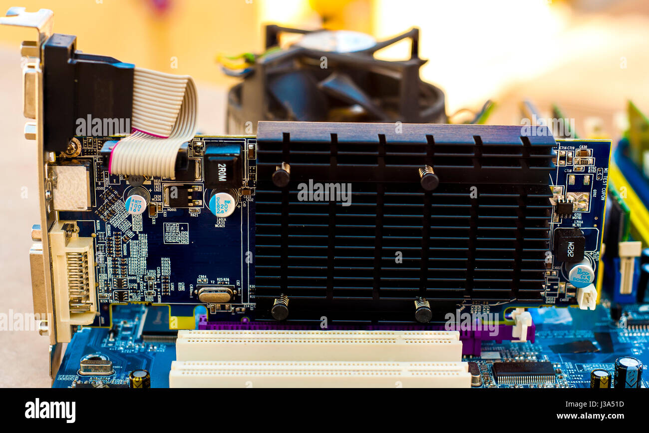 Computer Hardware. Motherboard with video card Stock Photo Alamy