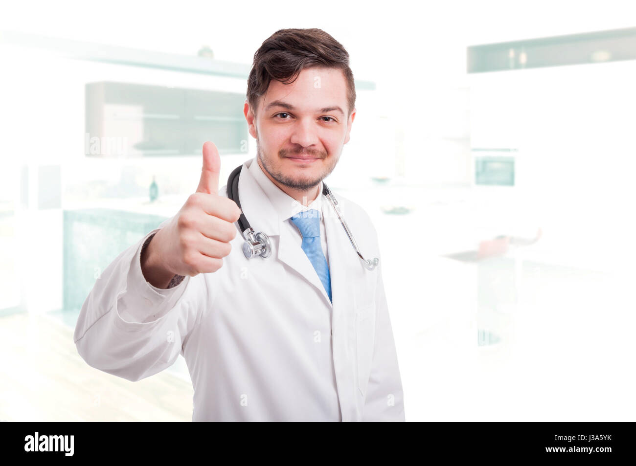 Male doctor giving thumbs up hi-res stock photography and images - Alamy