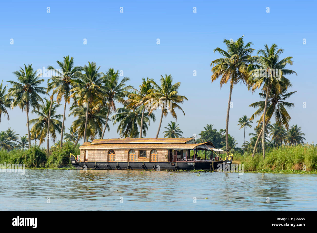 Traditional houseboat on the Kerala backwaters near Alleppey (Alappuzha ...