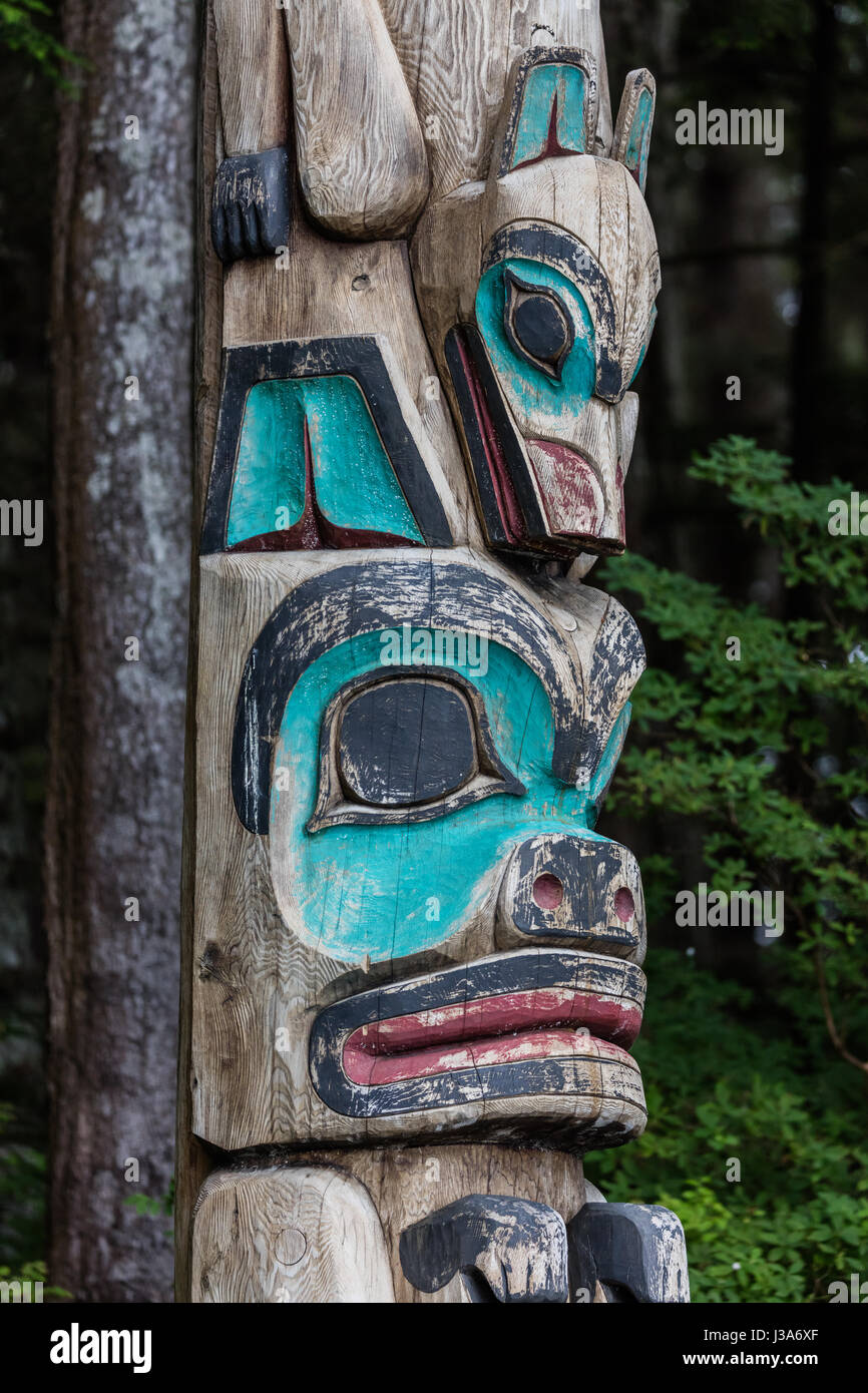 Native American totem poles in Alaska Stock Photo - Alamy