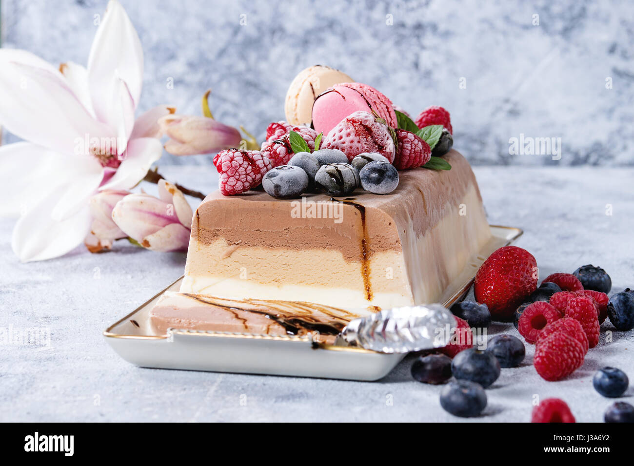 Three layers ice cream cake Stock Photo Alamy
