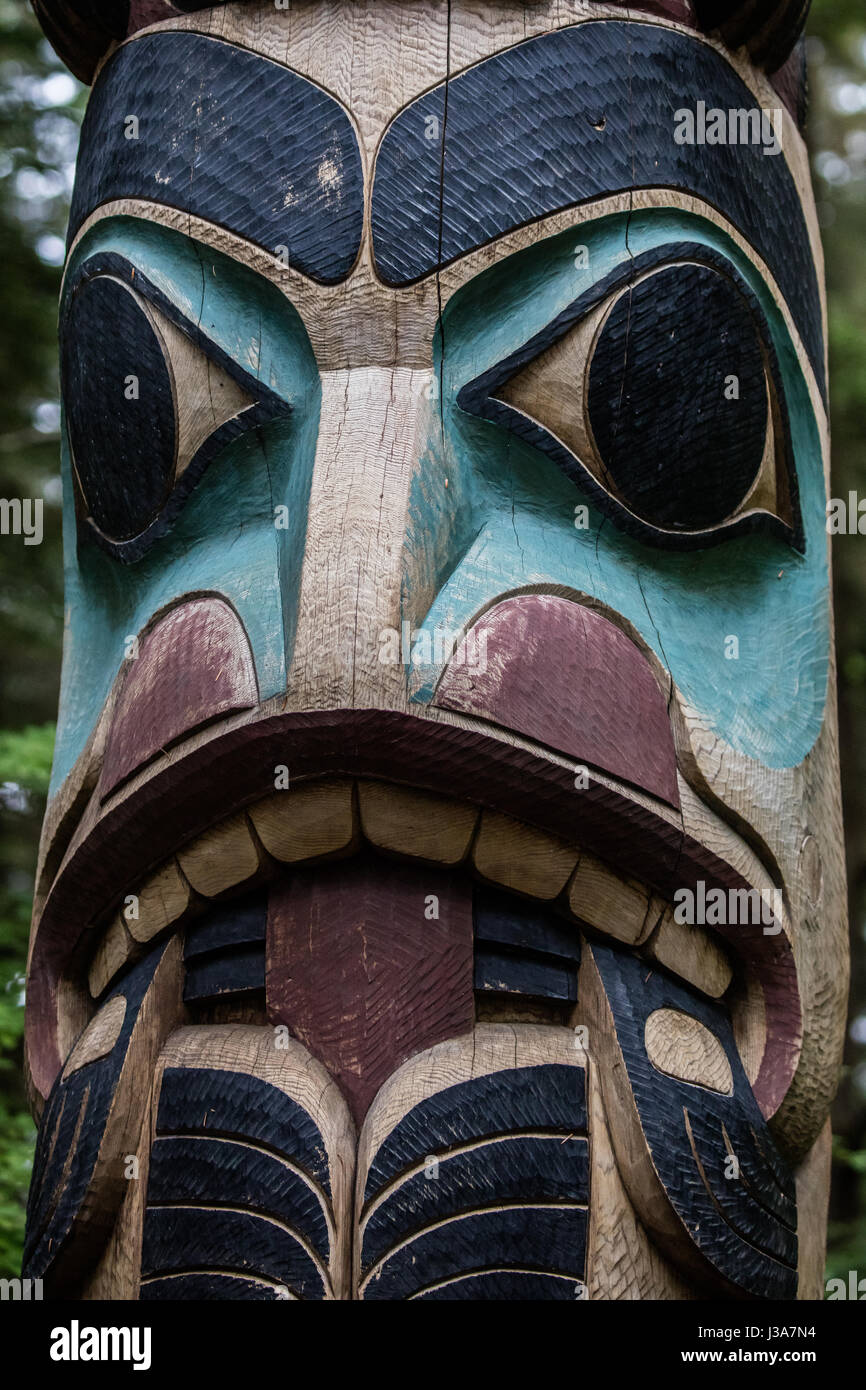 Native American totem poles in Alaska Stock Photo - Alamy