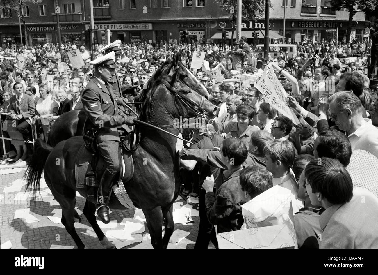 Mounted police push back demonstrators in Berlin, 1967 Stock Photo