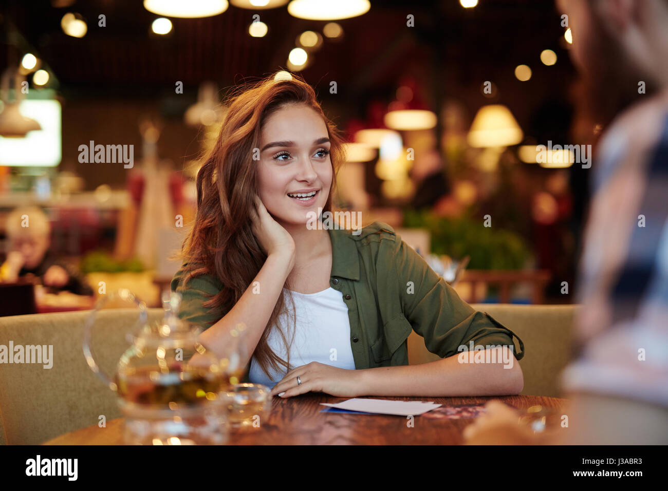 Pretty Woman Having Date in Cafe Stock Photo