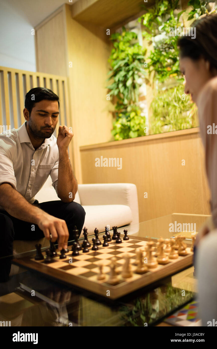 Colleagues playing chess hi-res stock photography and images - Alamy