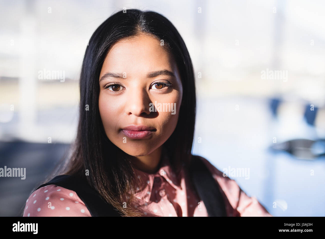 Portrait of young businesswoman at office Stock Photo - Alamy