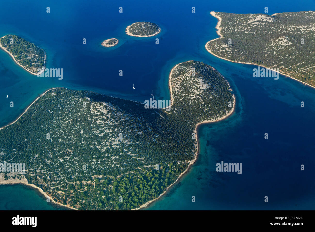 Aerial view of the indented coast with islands in the Adriatic Sea in ...