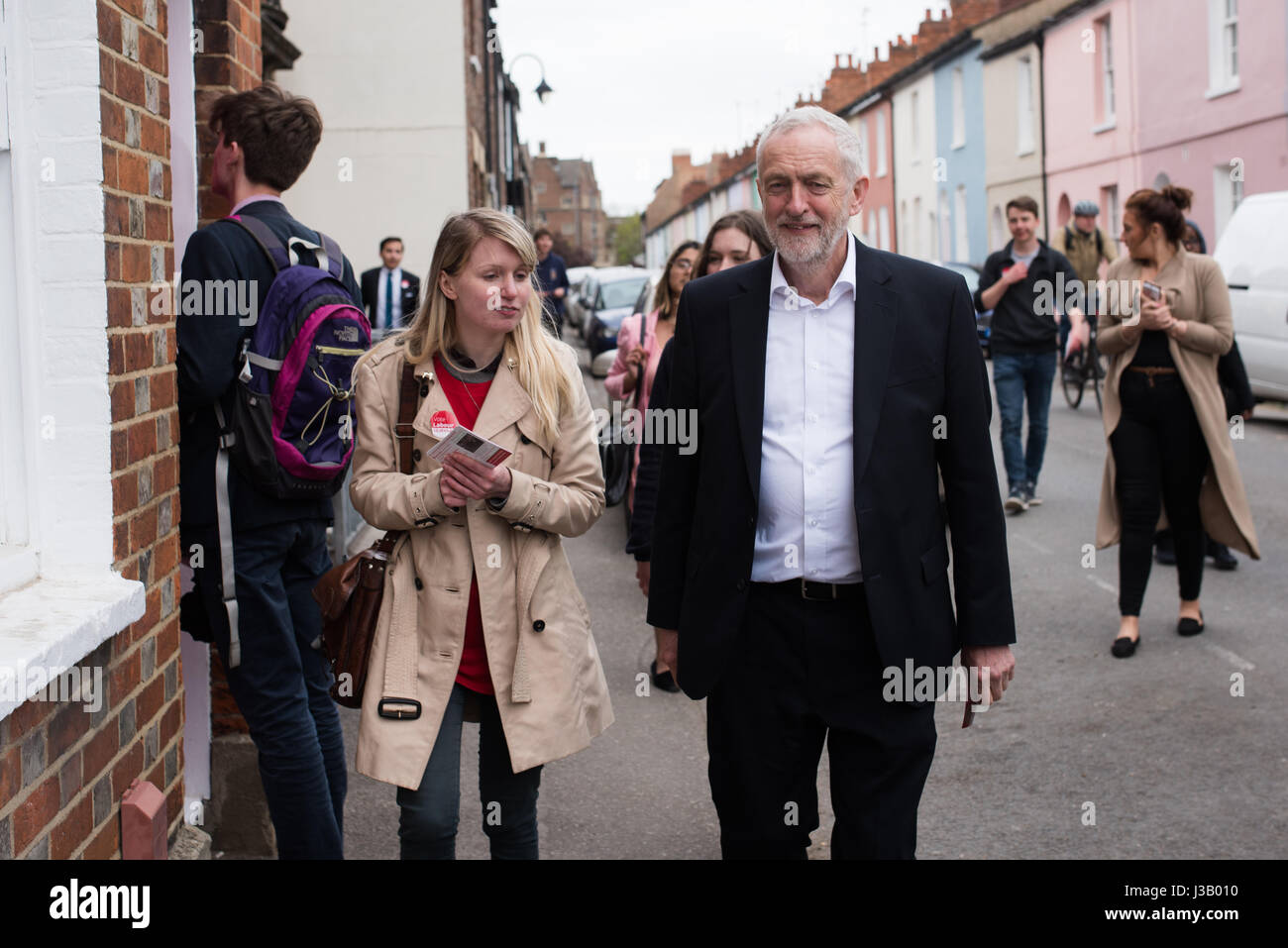 London, UK. 4th May, 2017. Labour leader Jeremy Corbyn joined local Labour county council candidate, Emma Turnball, to knock on doors in Oxford on polling day for local elections across the country. Student Labour activists from Oxford University joined Corbyn and Turnball as they spoke to voters. Credit: Jacob Sacks-Jones/Alamy Live News. Stock Photo
