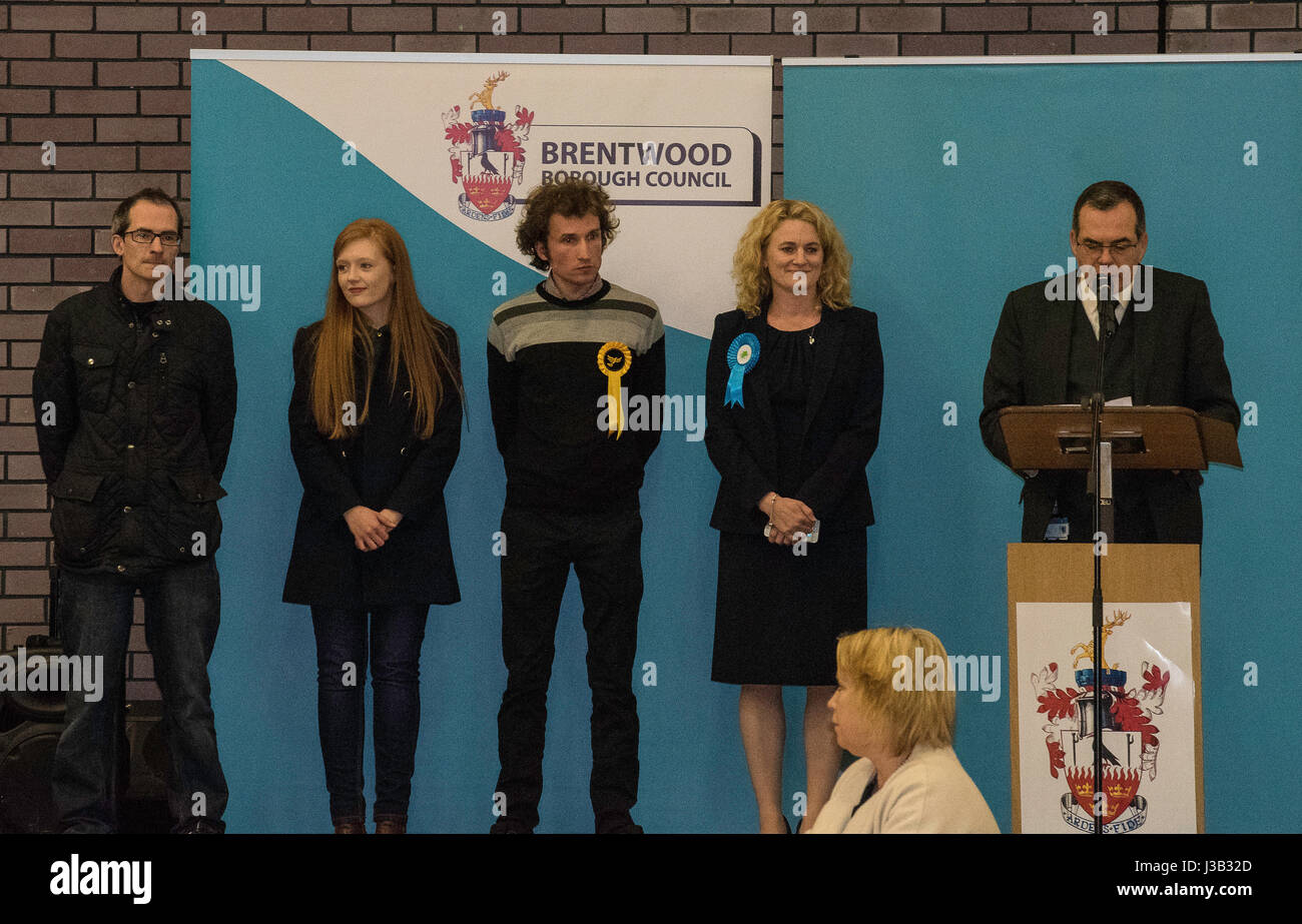 Brentwood, UK. 4th May, 2017. The Election result for Louise McKnlay, Conservative leader of Essex County Council, (second right) is announced - winning the seat with, 3,533 votes, other candidates from left to right,, Alistair Stephen, Green Party, Emma Benson, Labour Party and Dominic Naylor, Liberal Democrats Credit: Ian Davidson/Alamy Live News Stock Photo