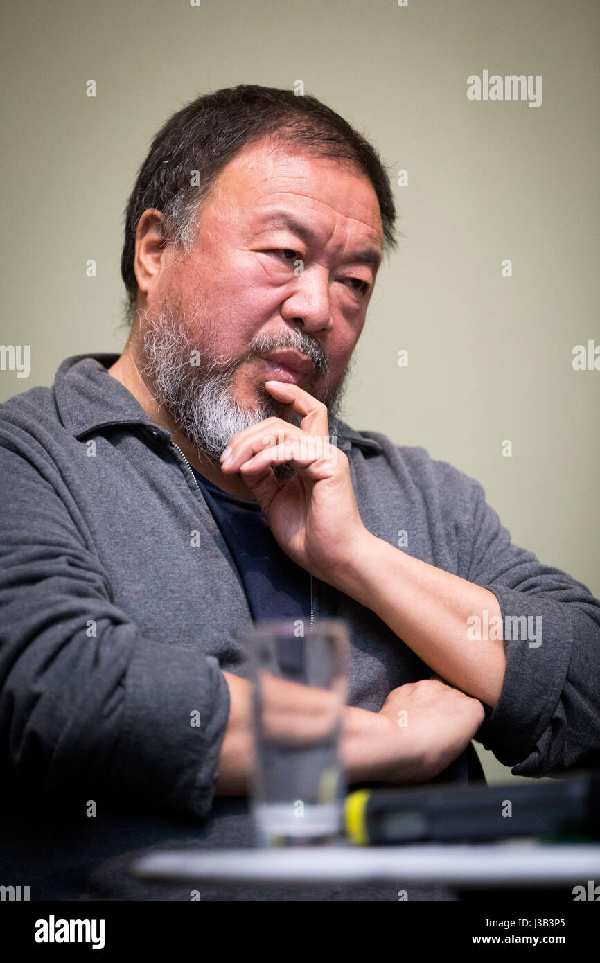 Schwerin, Germany. 4th May, 2017. The Chinese artist Ai Weiwei speaks during a discussion in the Galerie Alte & Neue Meister at the State Museum in Schwerin, Germany, 4 May 2017. Ai Weiwei spoke on the work and influence of the French-American painter and object artist Marcel Duchamp (1887-1968). Photo: Christian Charisius/dpa/Alamy Live News Stock Photo