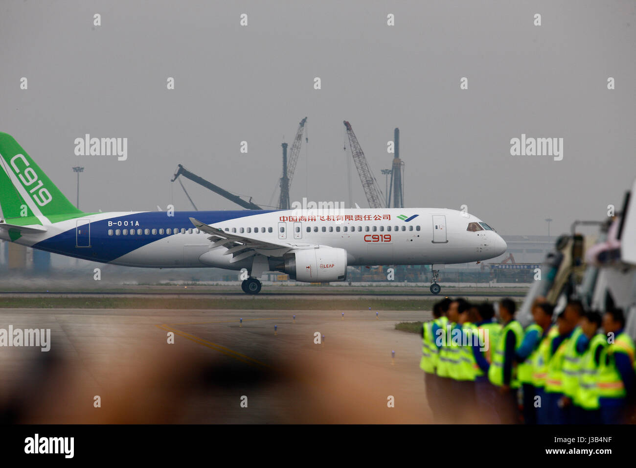 Shanghai, China. 5th May, 2017. China's homegrown large passenger plane C919 taxies on a runway ahead of its maiden flight in Shanghai, east China, May 5, 2017. Credit: Fang Zhe/Xinhua/Alamy Live News Stock Photo