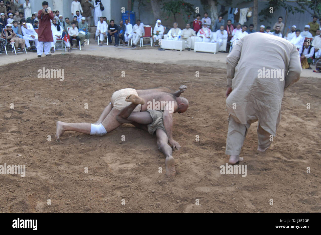 Pakistan. 5th May 2017. Wrestlers are in form in ring during match at ...