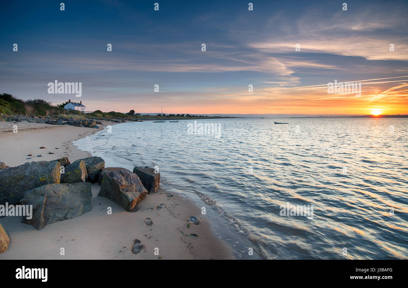 Beautiful sunrise over the beach at Crow Point near Barnstaple on the north coast of Devon Stock Photo