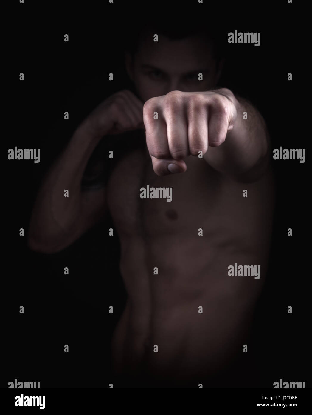 Boxing concept. Closeup boxer fist. Focus on the hand Stock Photo - Alamy