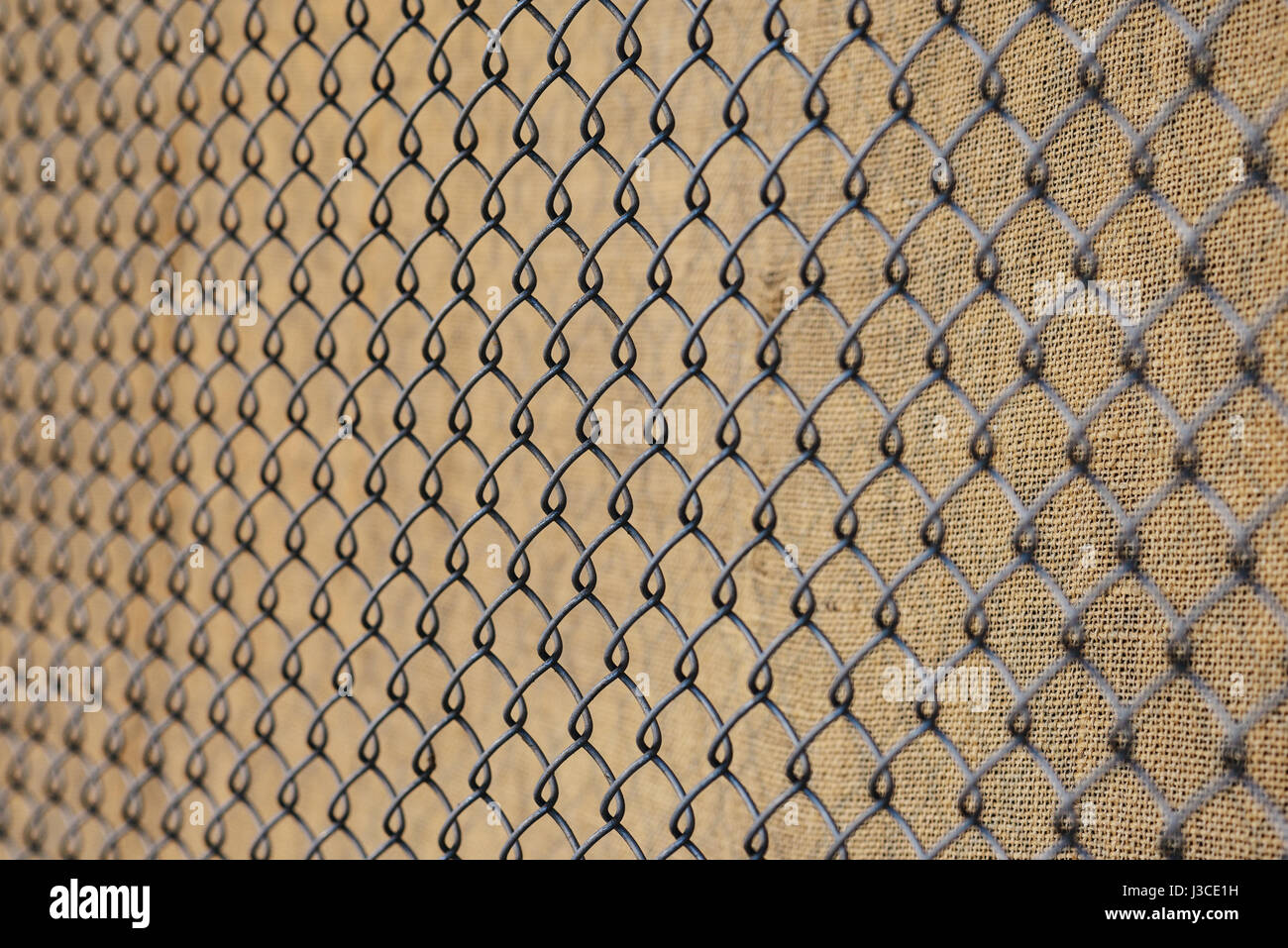 fence with metal grid in perspective, background Stock Photo - Alamy