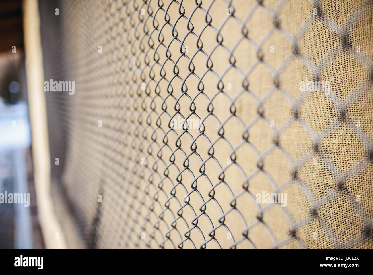 fence with metal grid in perspective, background Stock Photo - Alamy