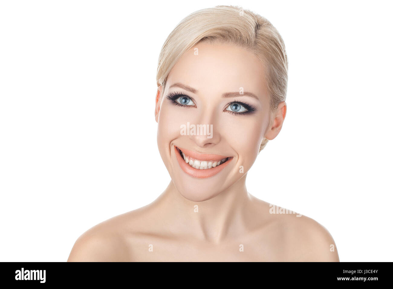 Close-up portraits blonde girl smiling broadly and beautiful eyes. Stock Photo