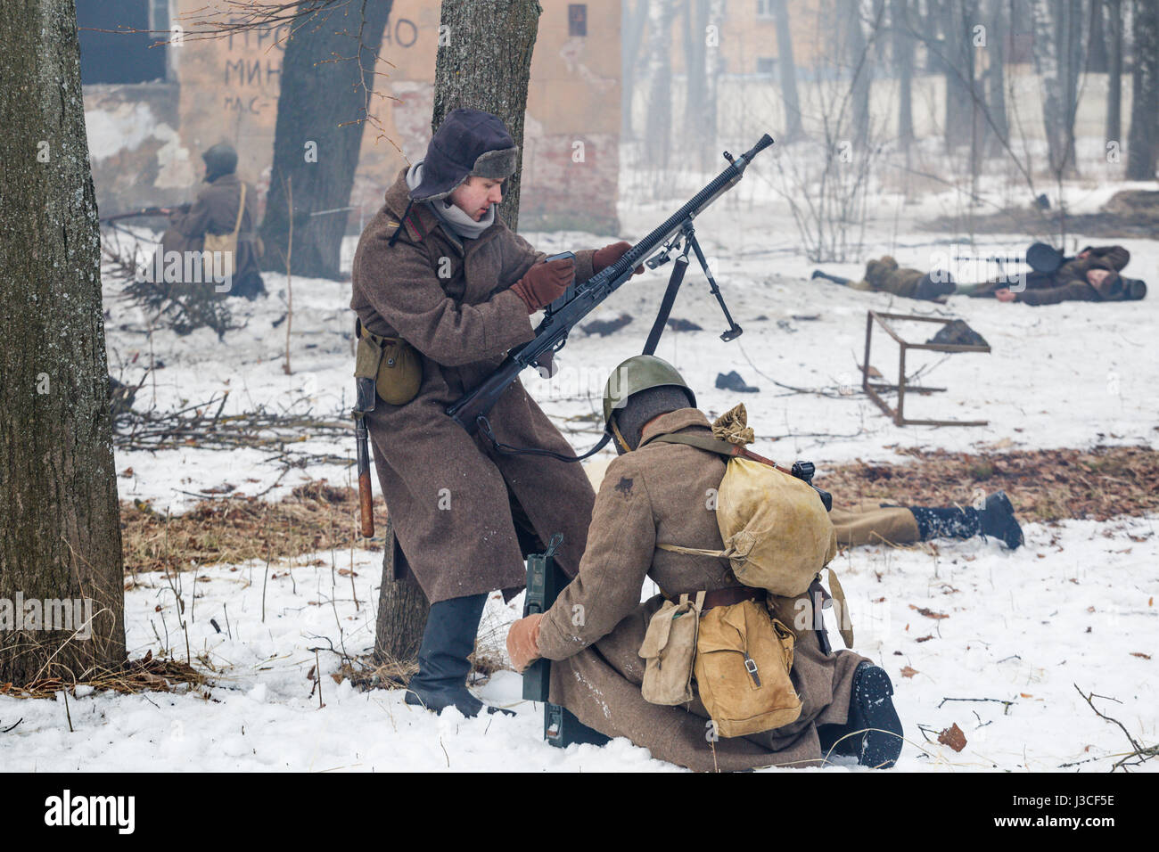 Russian gunner and troopers attack germany position. Stock Photo