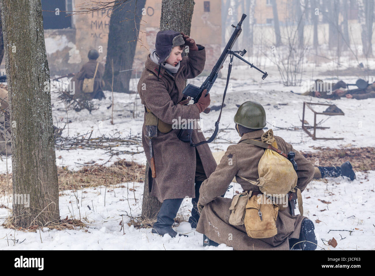 Russian gunner and troopers attack germany position. Stock Photo