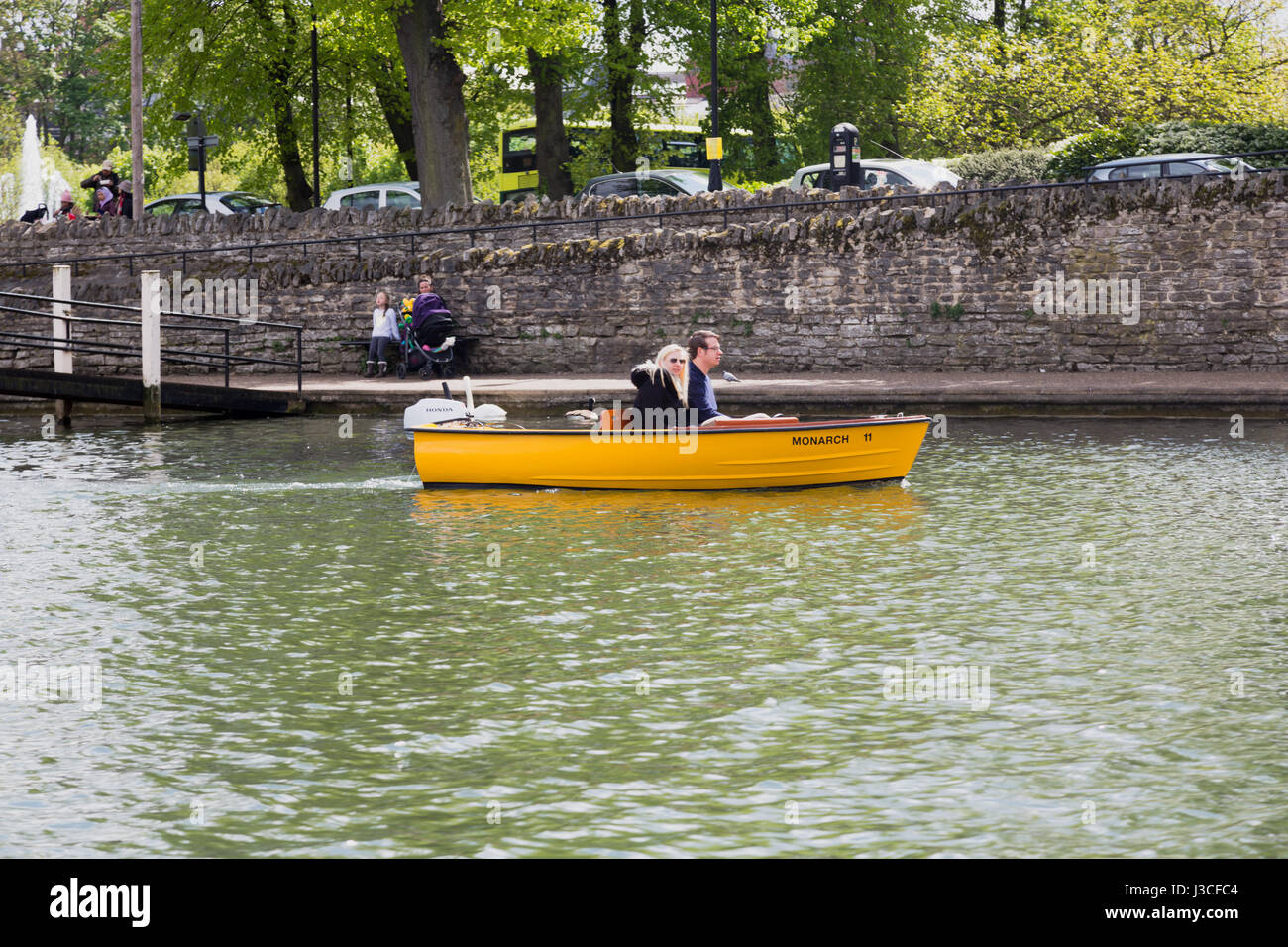Couple in hired boat on the river Thames Stock Photo
