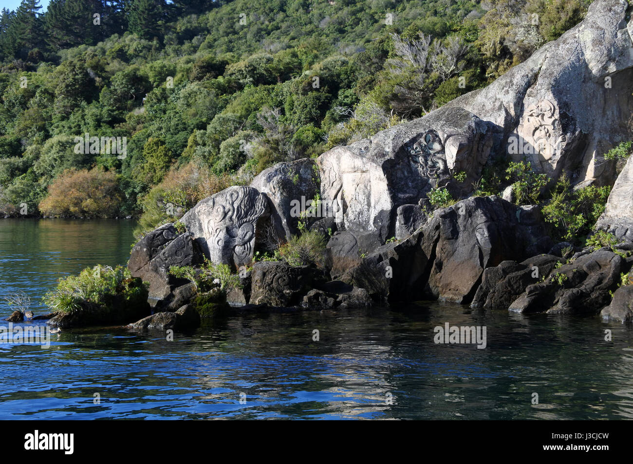Maori Rock Carving at lake Taupo in the North Island of New Zealand Stock Photo
