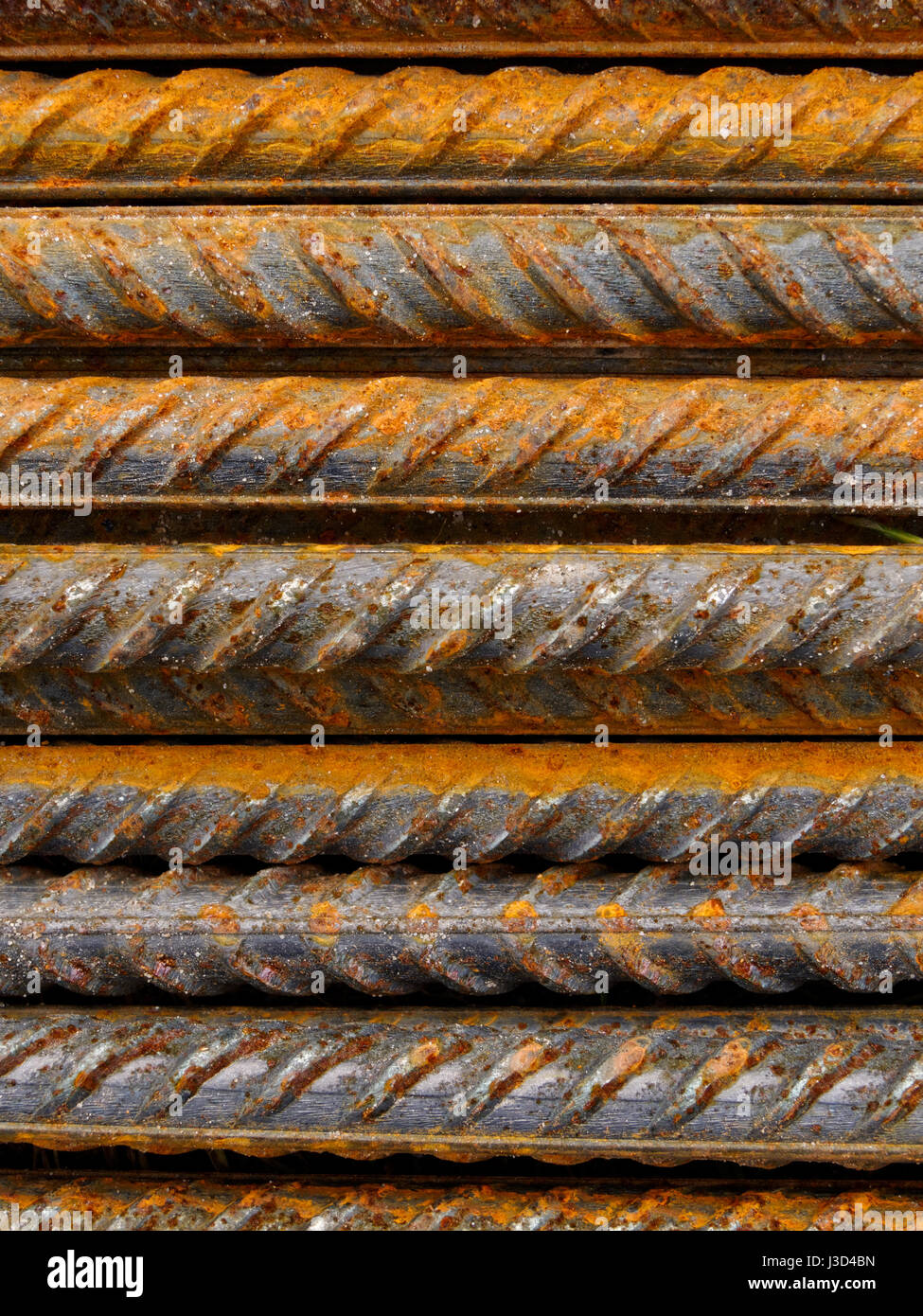 Backgrounds and textures: bunch of reinforcement steel bars, textured and rusty, industrial abstract Stock Photo
