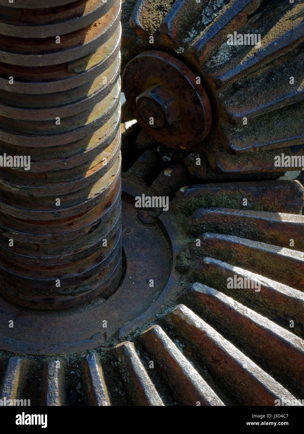 Backgrounds and textures: part of some very old machinery with cog-wheels, aged and rusty Stock Photo