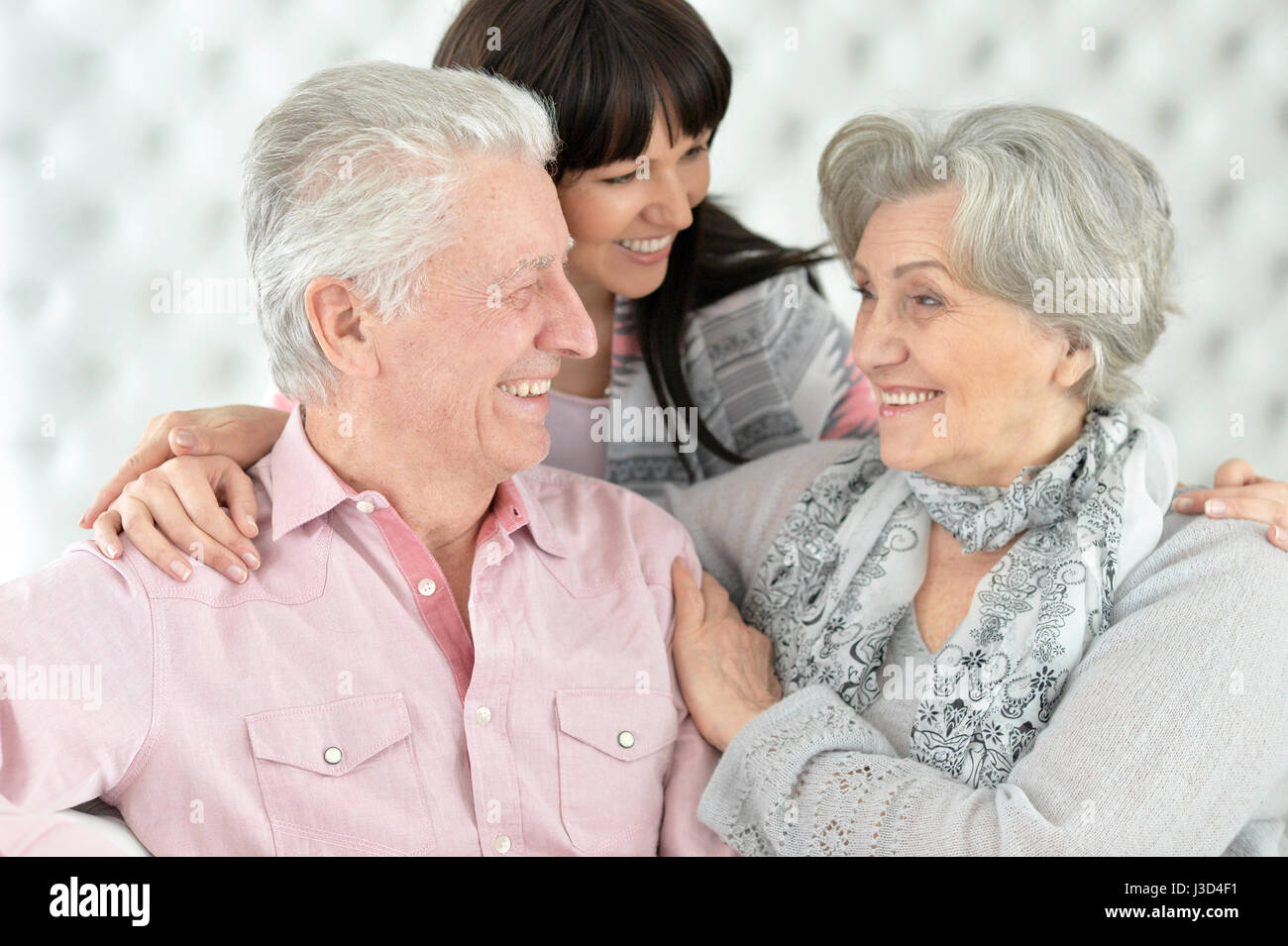 Happy parents with an adult daughter Stock Photo