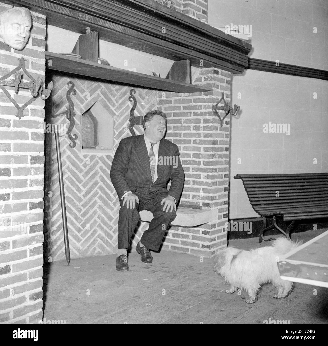 Swiss actor Michel Simon at home in Noisy-le-Grand, c.1958. Stock Photo
