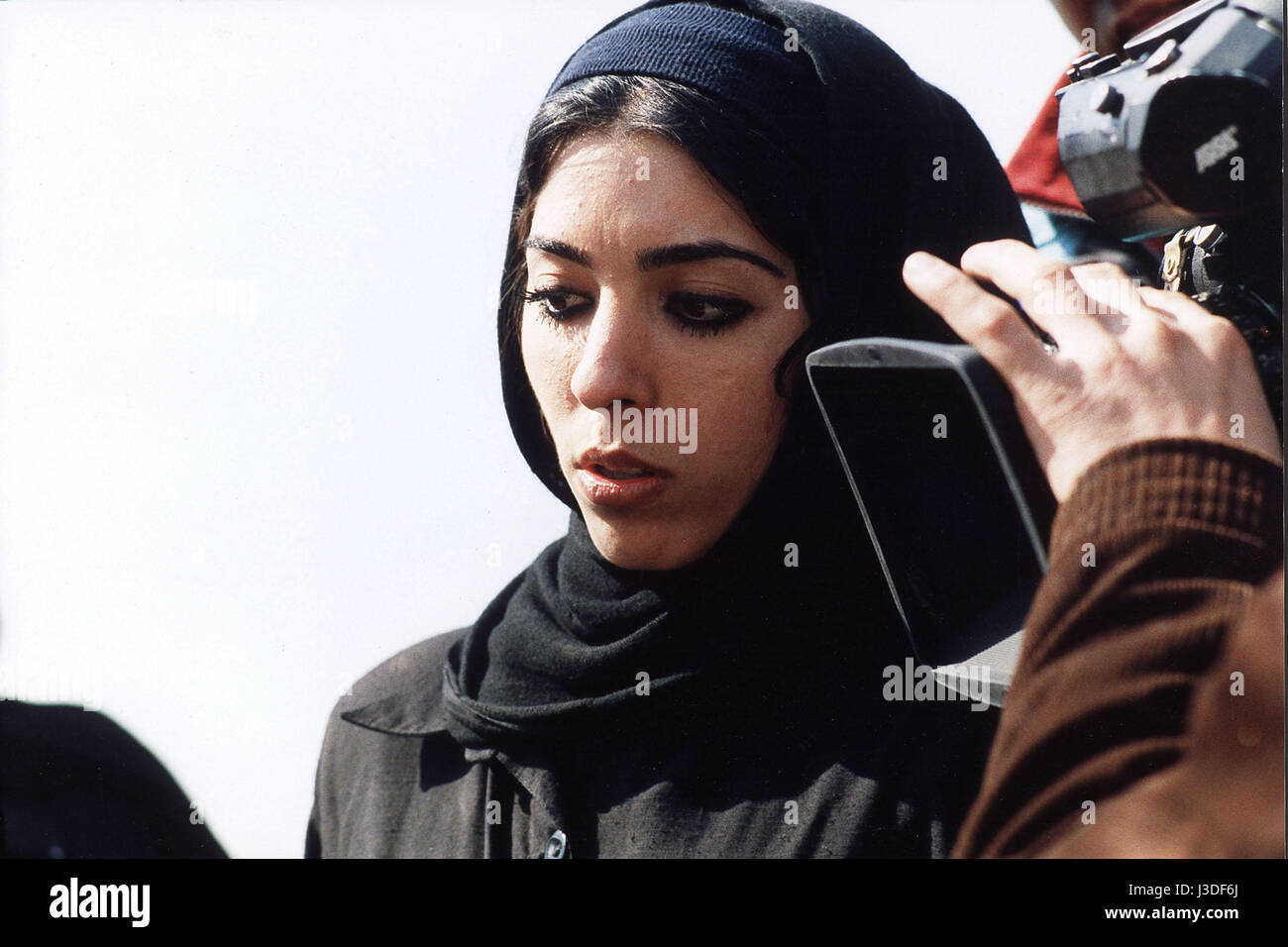 11'09'01 september 11 - segment 'God, Construction and Destruction'  Year: 2002 - UK / France / Egypt / Japan / Mexico / USA / Iran Director: Samira Makhmalbaf Samira Makhmalbaf Shooting picture Stock Photo